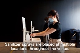 Sanitizer sprays are placed at multiple locations throughout the venue.